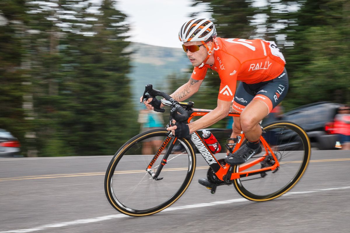 Rally Cycling's Evan Huffman takes a corner during stage 5 in Utah