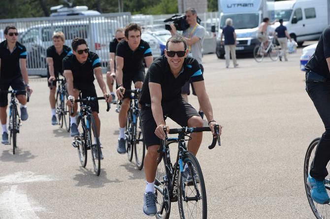 Richie Porte and Team Sky ride to the press con