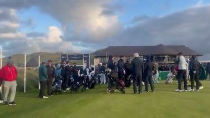 Players wait for a playoff at The Amateur Championship