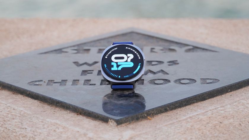 The Samsung Galaxy Watch 8 showing an athletic watch face on a plaque.