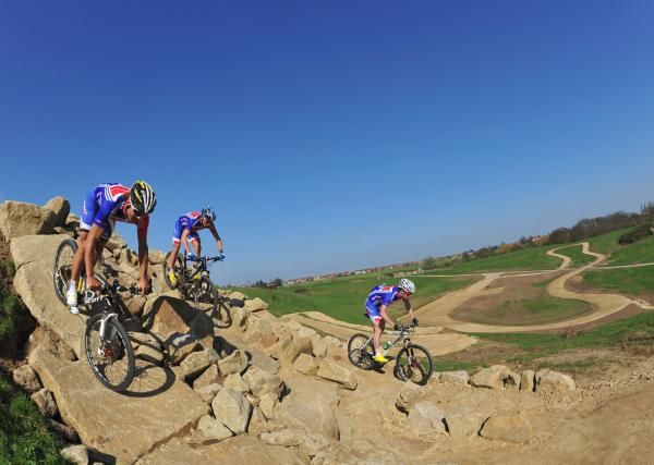 British National Team racers test out new rock features on the 2012 Olympic Games mountain bike course.