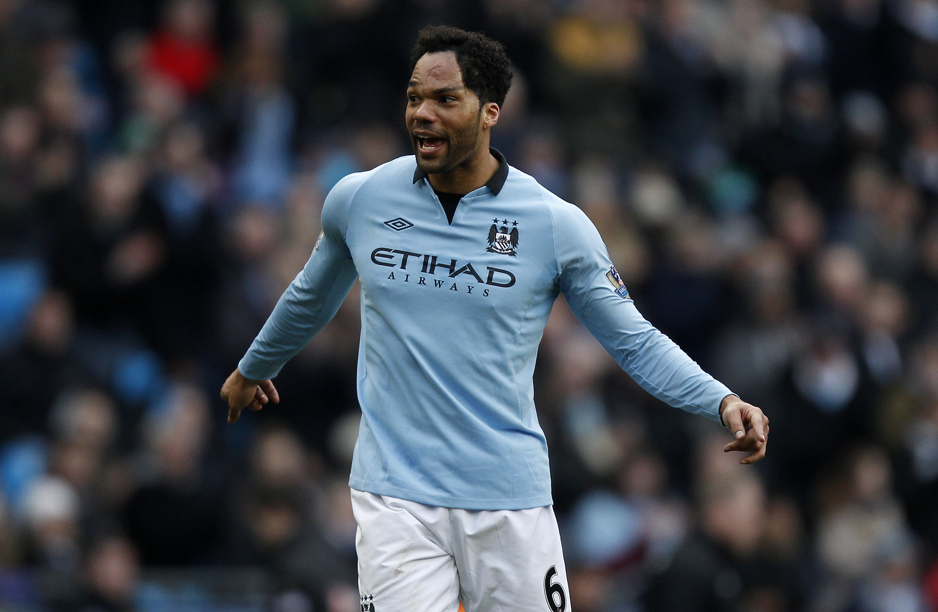 Lescott won two Premier League titles at City and now has an off-field role at the club