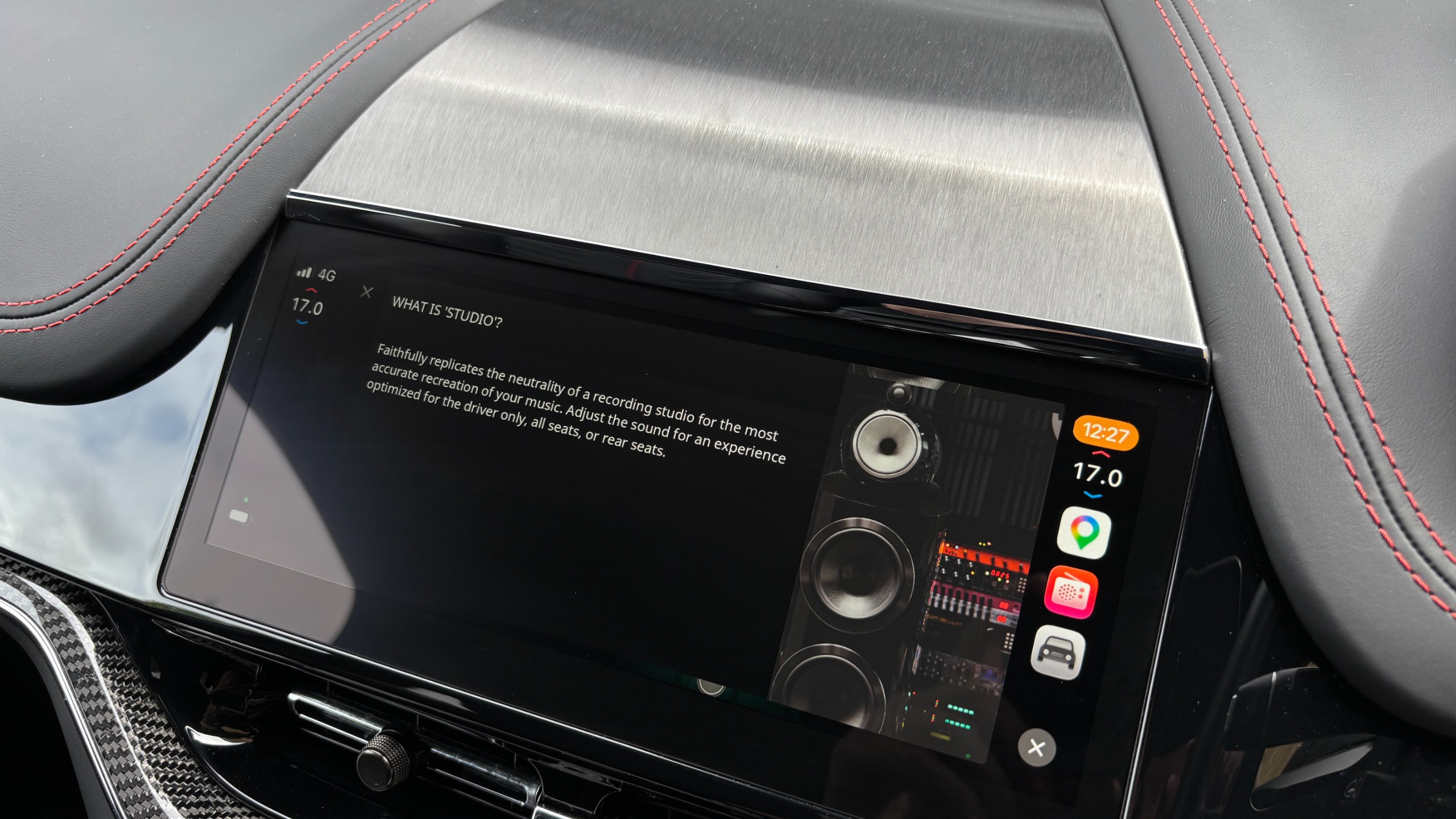 The infotainment display for an Aston Martin DBX S showing the Pure sound mode