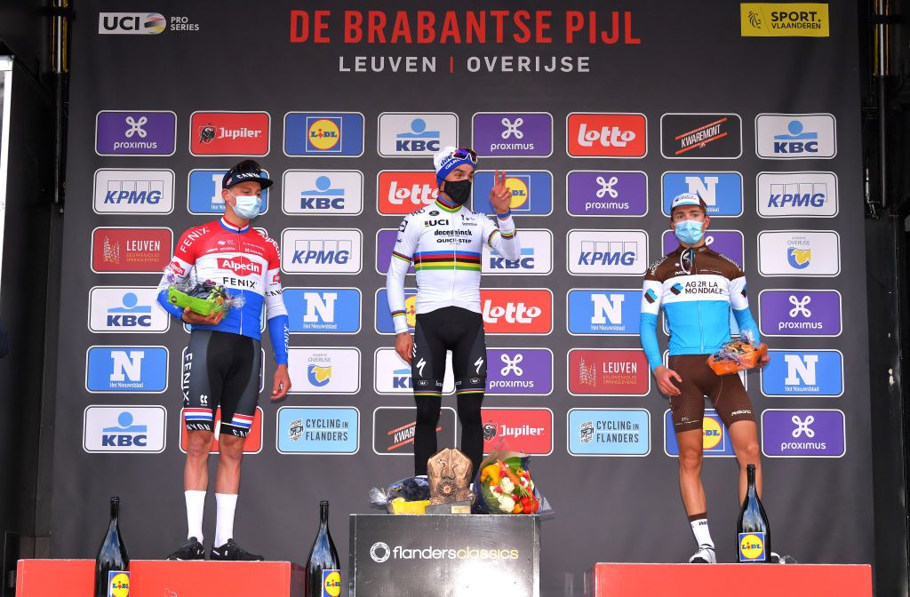 OVERIJSE BELGIUM OCTOBER 07 Podium Mathieu Van Der Poel of Netherlands and Team AlpecinFenix Julian Alaphilippe of France and Team Deceuninck QuickStep Benoit Cosnefroy of France and Team Ag2R La Mondiale Celebration during the 60th Brabantse Pijl 2020 Men Elite a 197km race from Leuven to OverijseSchavei 106m La Flche Brabanonne BP20 on October 07 2020 in Overijse Belgium Photo by Luc ClaessenGetty Images