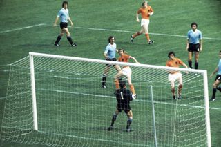 Johan Cruyff in action for the Netherlands against Uruguay at the 1974 World Cup.