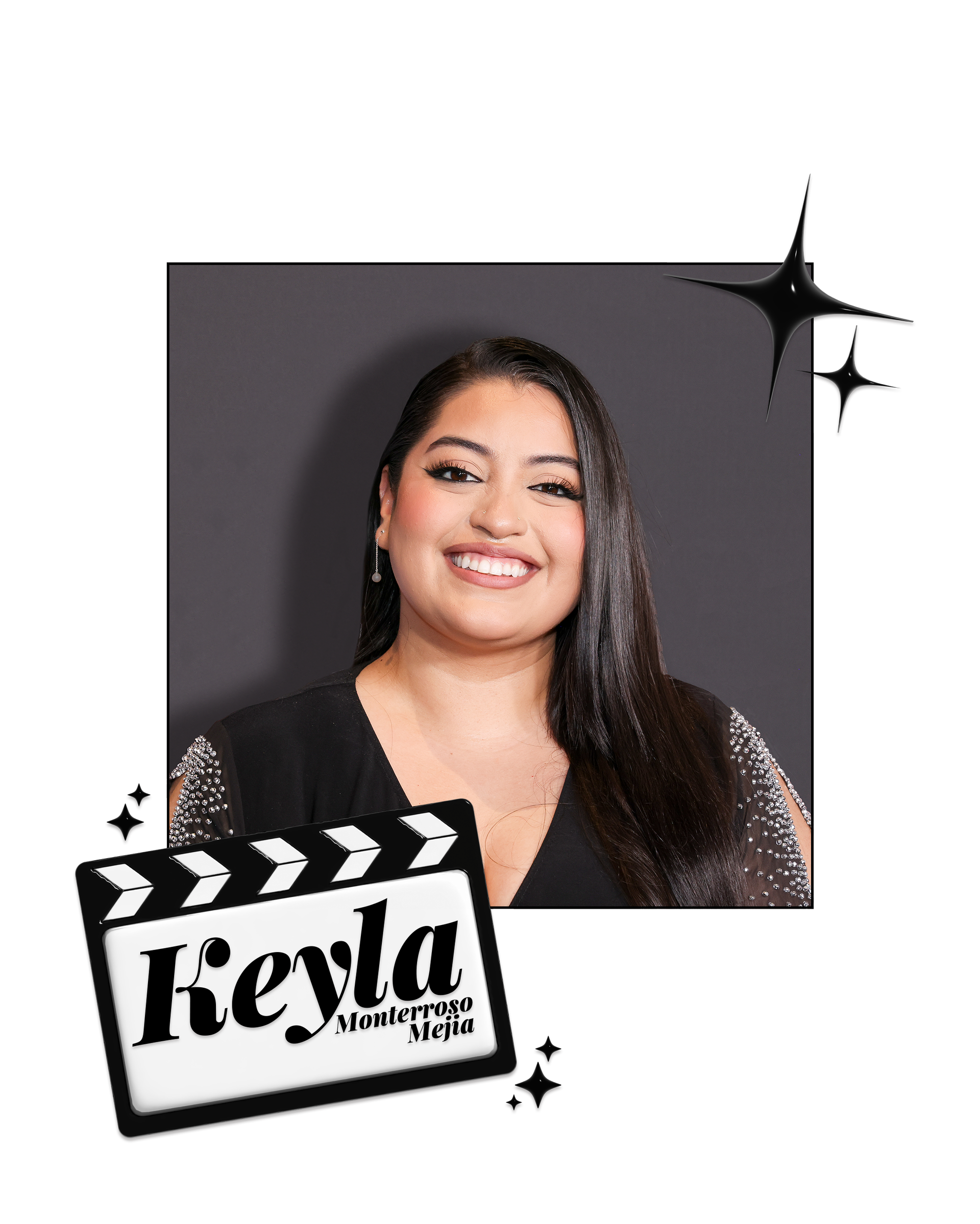 Keyla Monterroso Mejia smiles in front of a gray wall