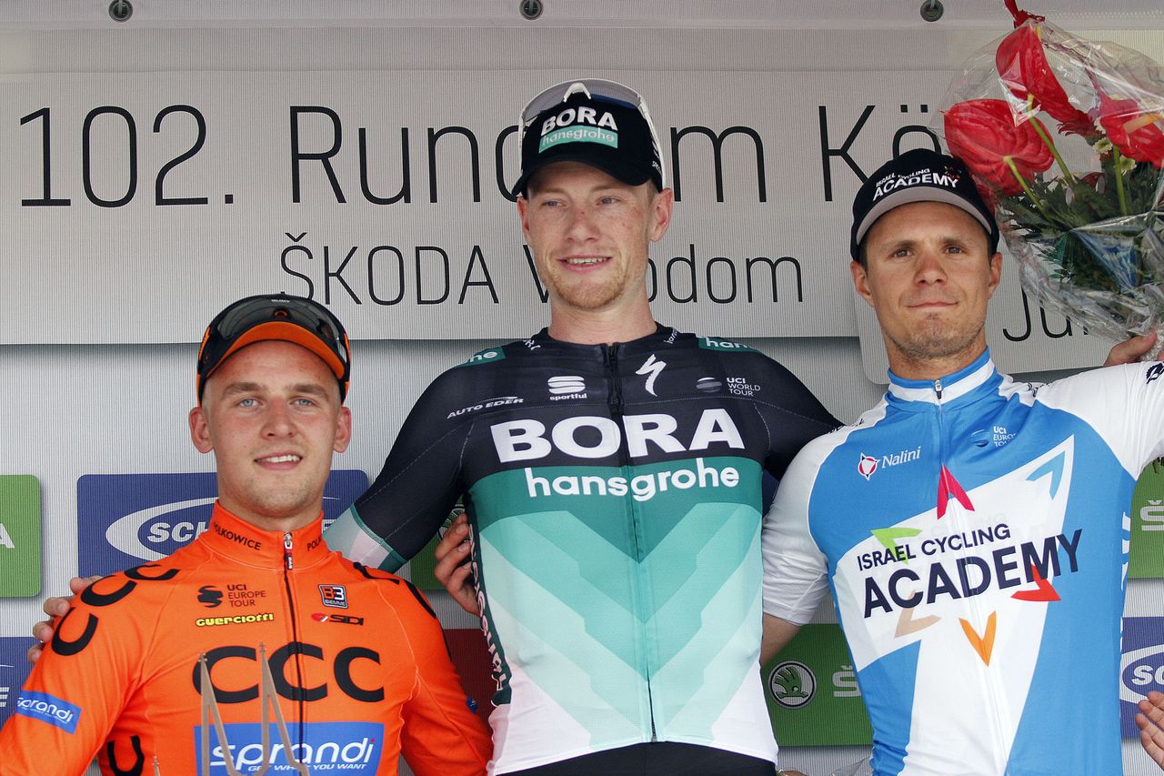 Szymon Sajnok, Sam Bennett and Mihkel Raim on the podium
