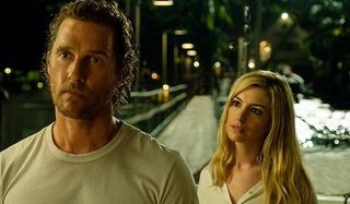 Serenity Matthew McConaughey and Anne Hathaway have a night time conversation on a dock