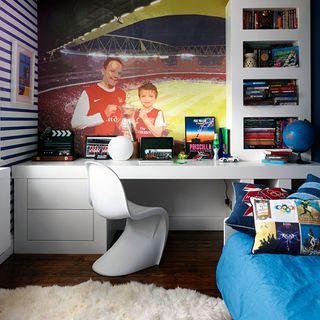 boys bedroom with personalised digital wallpaper paton chair in white and sheepskin rug