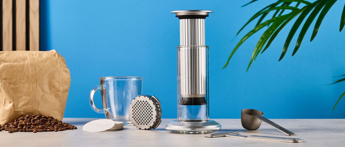 a glass AeroPress premium with aluminum flourishes 