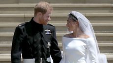 Prince Harry, Duke of Sussex and the Duchess of Sussex depart after their wedding ceremony at St George's Chapel at Windsor Castle on May 19, 2018