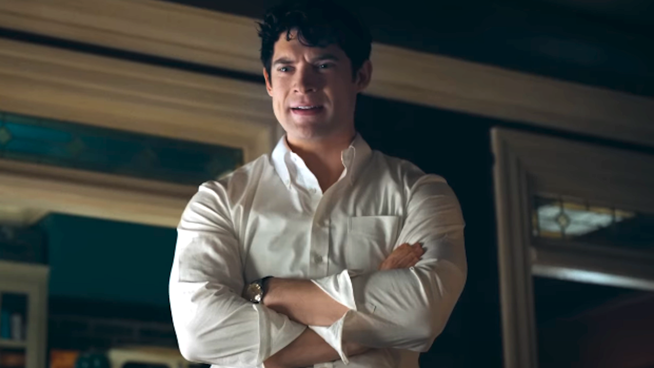 Clark Kent crossing his arms in a white buttonup in Superman (2025)