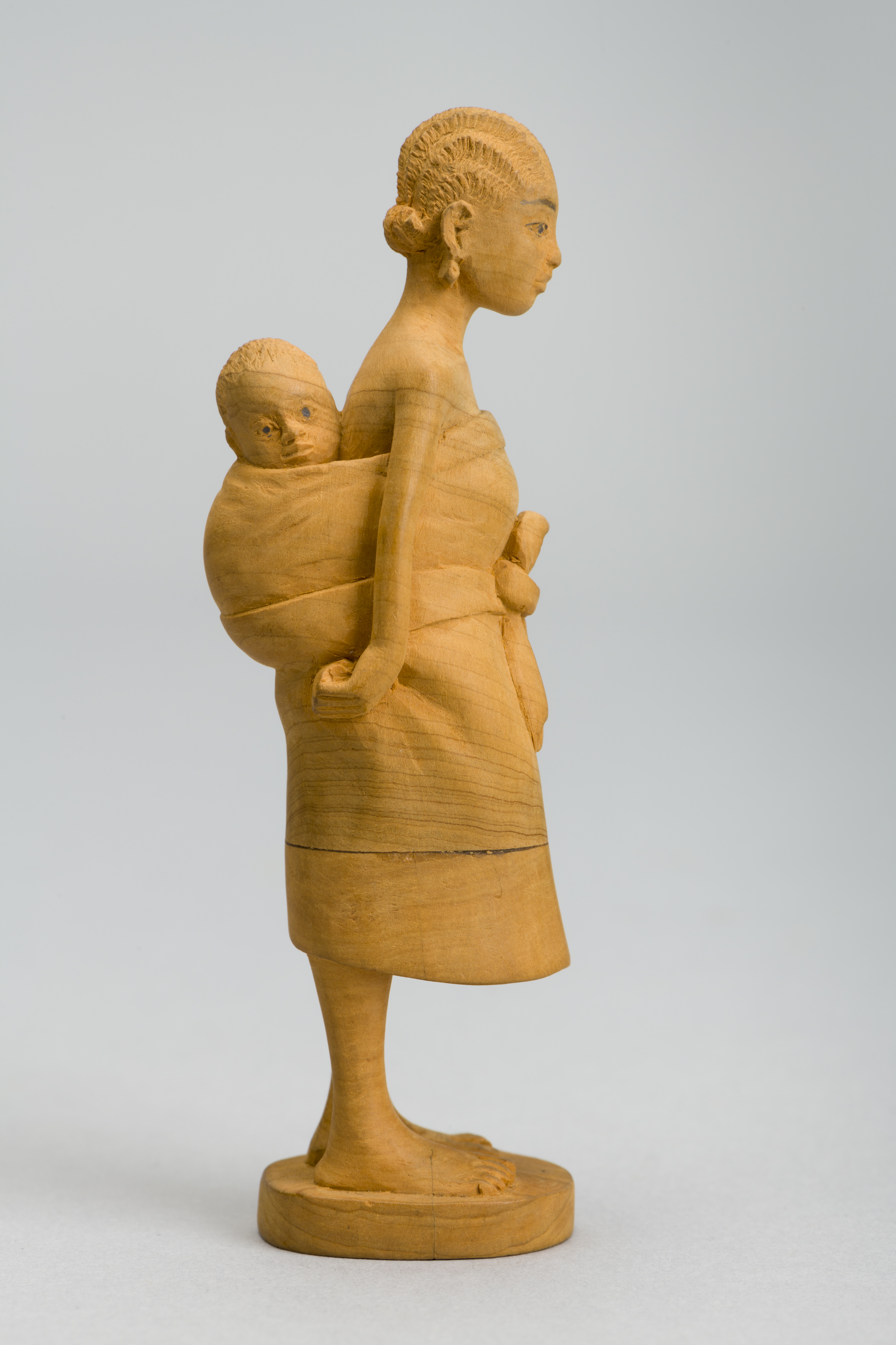 sculpture of woman with child on back, from &#039;Nigerian Modernism&amp;rsquo; exhibition