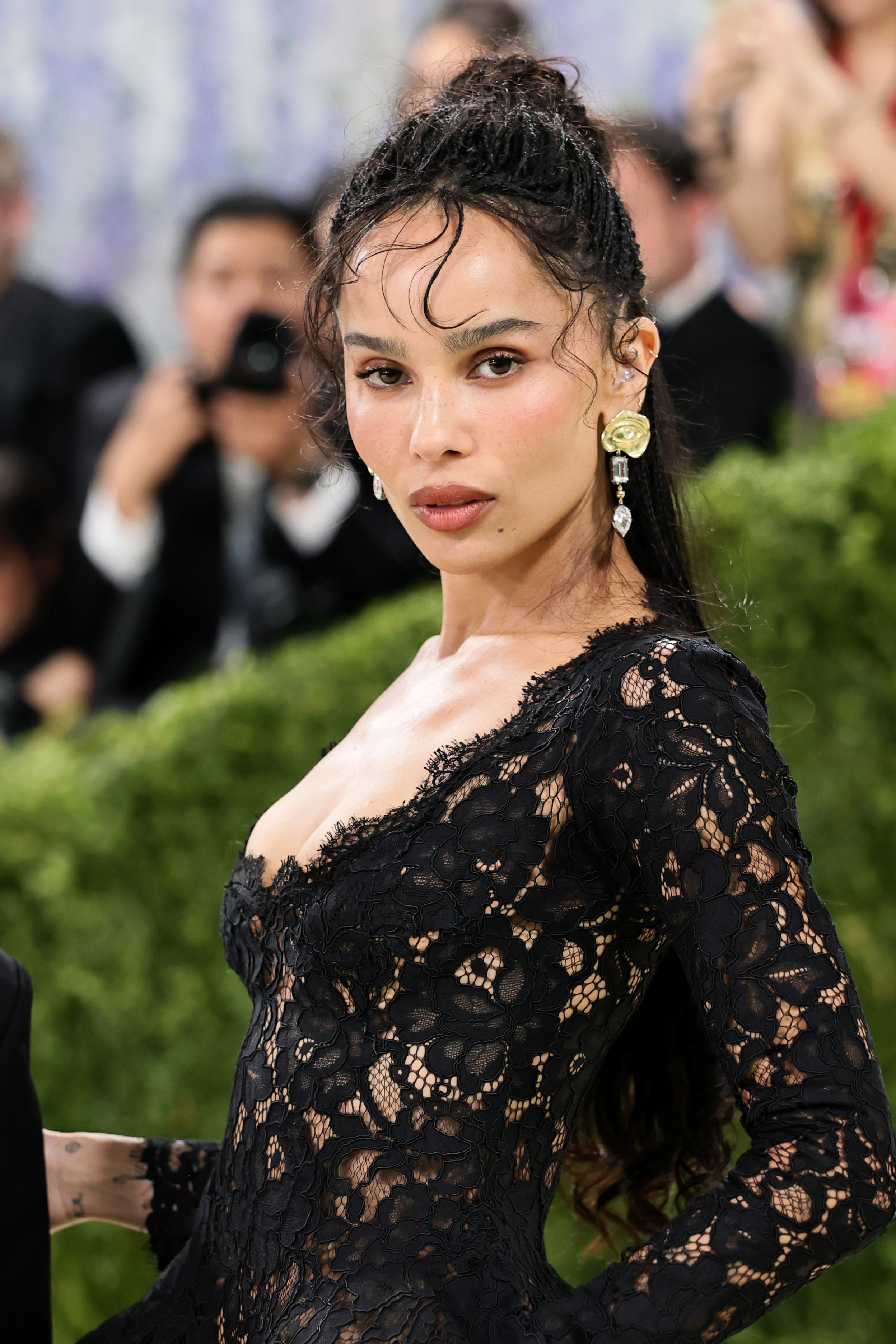 zoe kravitz wears a lace saint laurent dress.