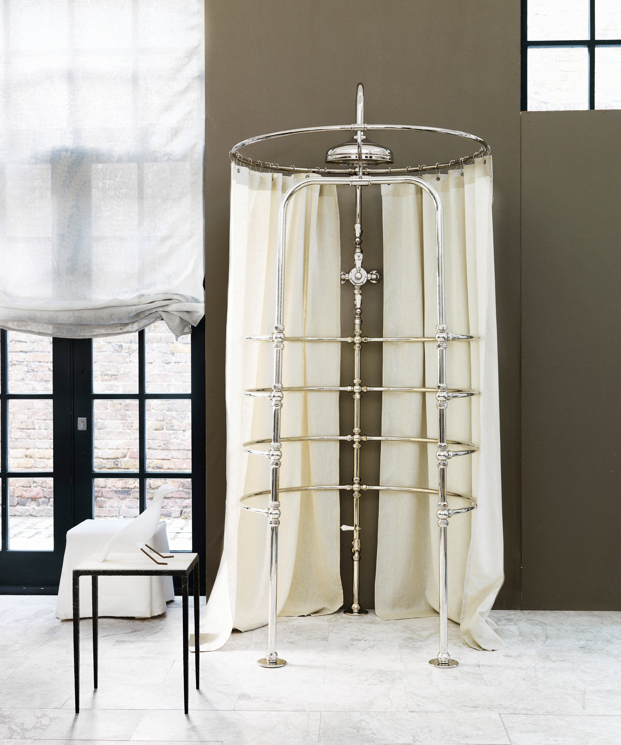 Vintage style shower curtain over round shower
