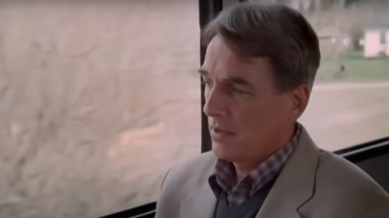 Mark Harmon on a train in For All Time