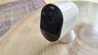 Arlo 4 Pro review: security camera on a wooden table