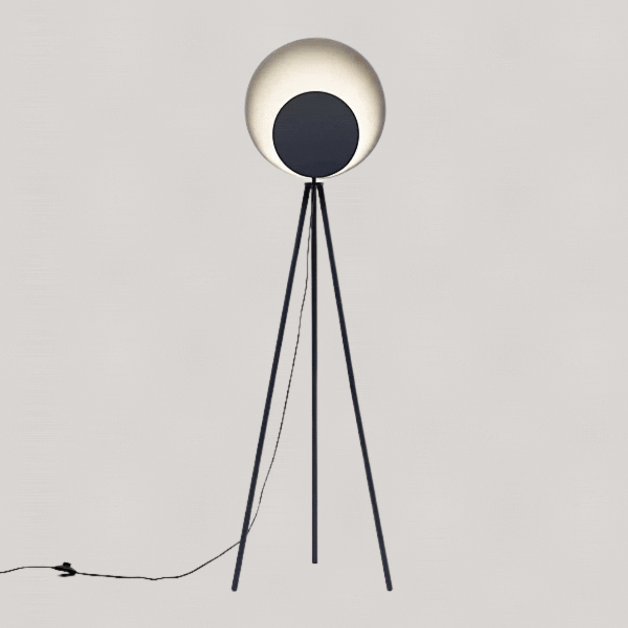 houseof Diffuser Tripod Floor Lamp, Charcoal Grey in a rotating gif showing it on and off against pale gray background.