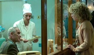 Lyudmilla Ignatenko, played by Jessie Buckley at the hospital looking for her husband in the HBO min