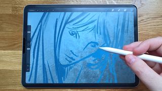 Rock Paper Pencil review; a person sketches on an iPad