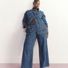 Model wearing a denim trouser and shirt set sold at Simply Be for Simply Be discount codes