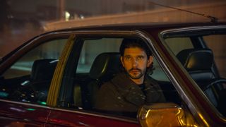 Ben Whishaw as Sam, sitting in the front seat of a car, in 'Black Doves.'