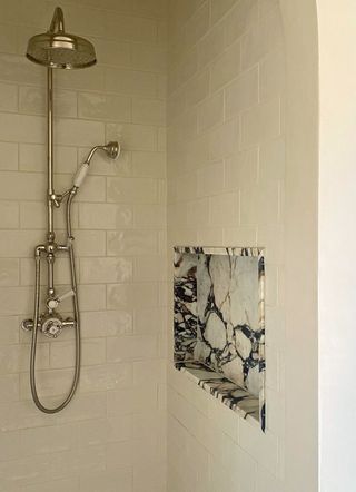 A shower niche made from marble offcuts