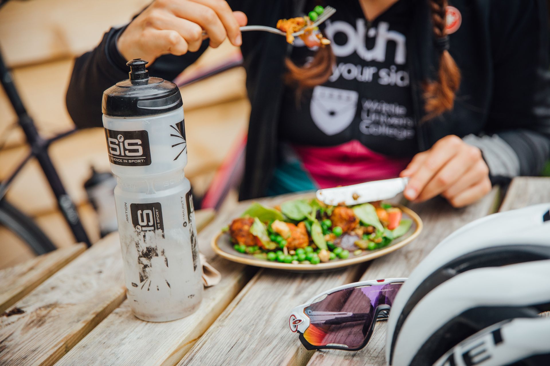Image shows a woman fuelling for cycling