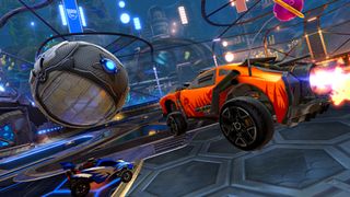 an orange car hits a football in Rocket League