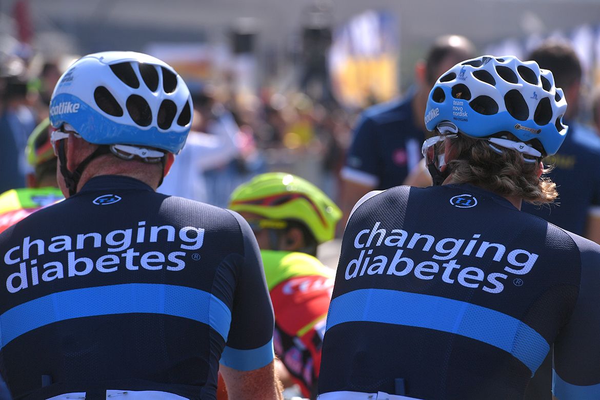 The Novo Nordisk riders await the start