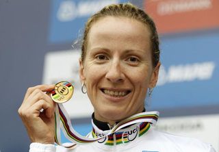 Judith Arndt smiles after finally winning a TT gold
