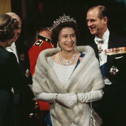 Queen Elizabeth wearing a tiara and fur stole