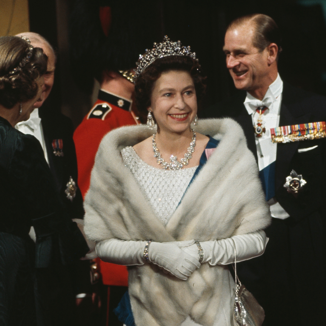 Queen Elizabeth wearing a tiara and fur stole