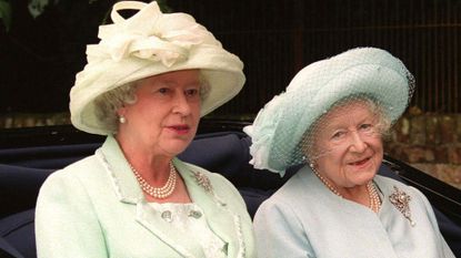 The Queen and the Queen Mother sit in a carriage as they attend a service at Sandringham Church July 22, 2001 in Norfolk, England. Buckingham Palace announced March 30, 2002 that the Queen Mother has died. She was 101-years-old. 