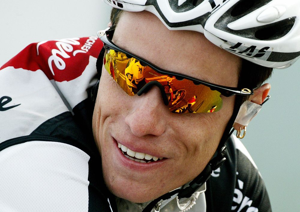 Sylvain Chavanel smiles as he rides during the 95th edition of Milan-San Remo in 2004.