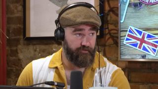 Jason Kelce wearing a paperboy hat during an episode of New Heights.