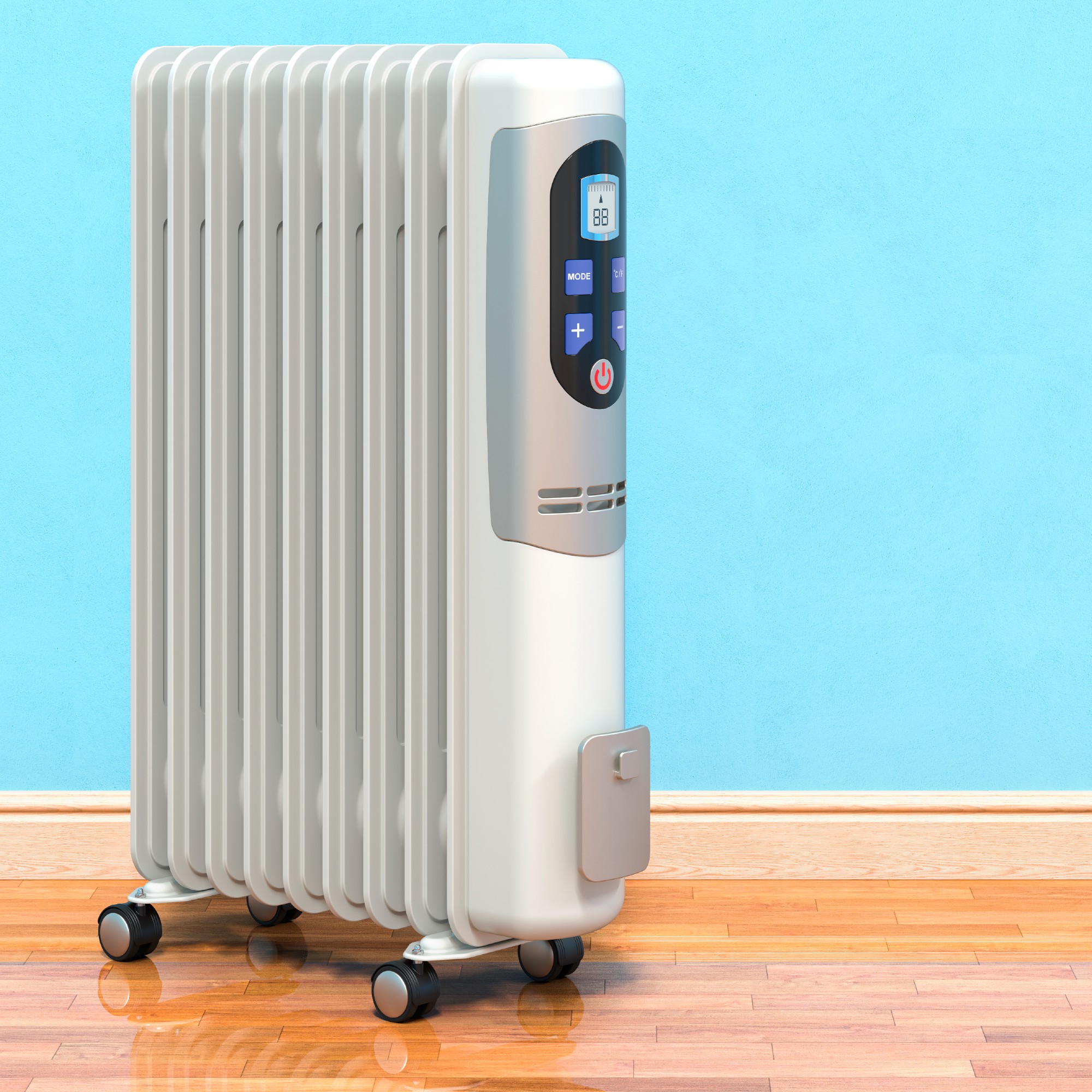 oil-filled radiator on a wooden floor in front of a blue wall