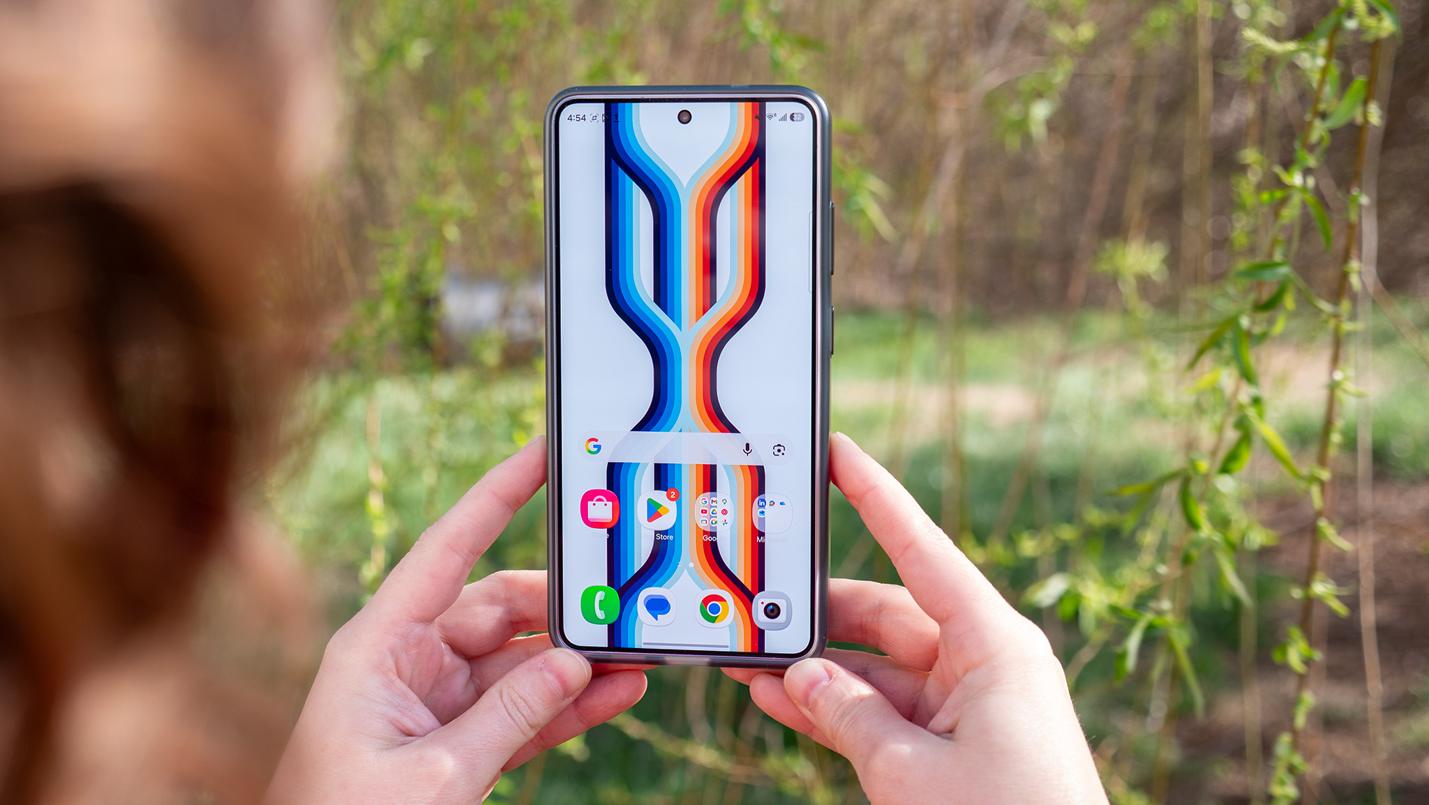 The Samsung Galaxy S26 Ultra's home screen with custom wallpaper from the Backdrops app