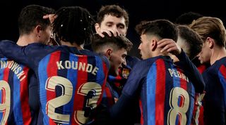 Barcelona players celebrate one of their goals in the 3-0 win over Sevilla at Camp Nou in February 2023.