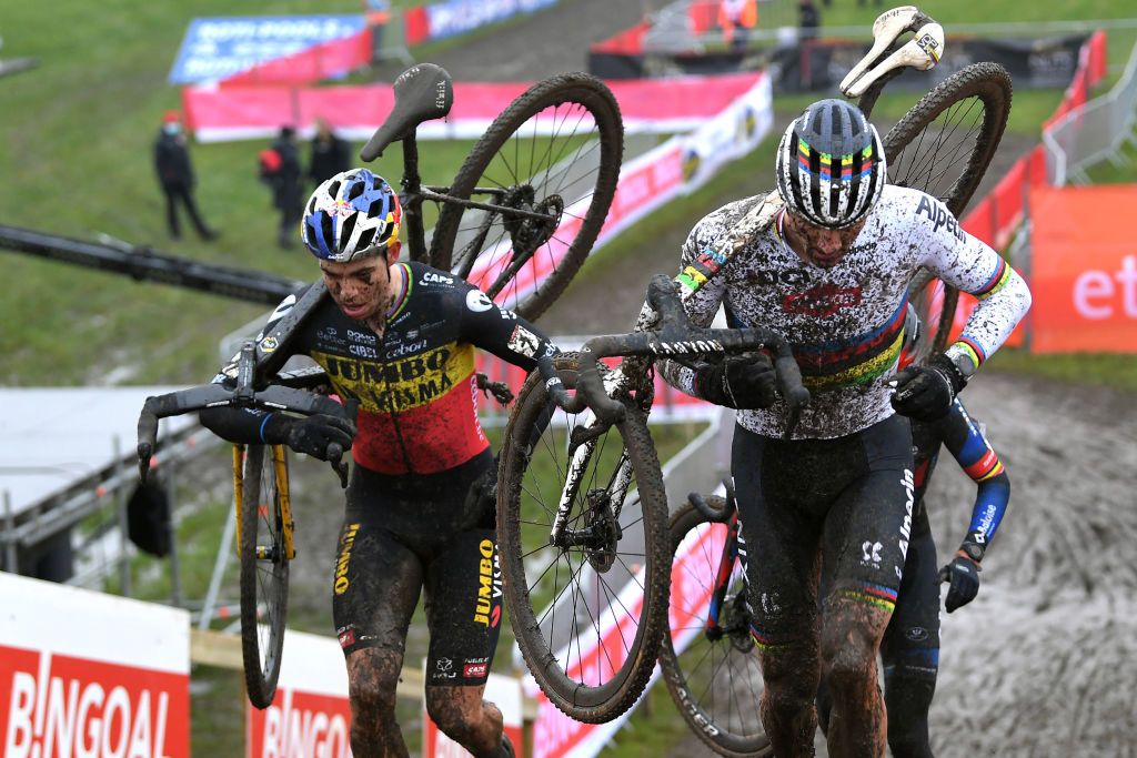 DENDERMONDE BELGIUM DECEMBER 26 LR Wout Van Aert of Belgium and Team JumboVisma and Mathieu Van Der Poel of The Netherlands and Team Alpecin Fenix compete during the 2nd Dendermonde UCI CycloCross Worldcup 2021 Mens Elite CXWorldCup UCIcyclocrossWC on December 26 2021 in Dendermonde Belgium Photo by Luc ClaessenGetty Images