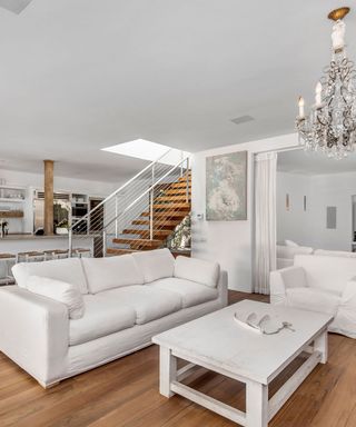 Pamela Anderson's house: Open plan grand room with chandelier in Pamela Anderson’s Malibu Beach House