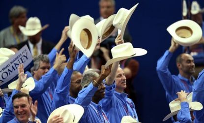 People from the Texas delegation wave cowboy hats during the third day of the Republican National Convention on August 29, 2012 in Tampa, Florida.