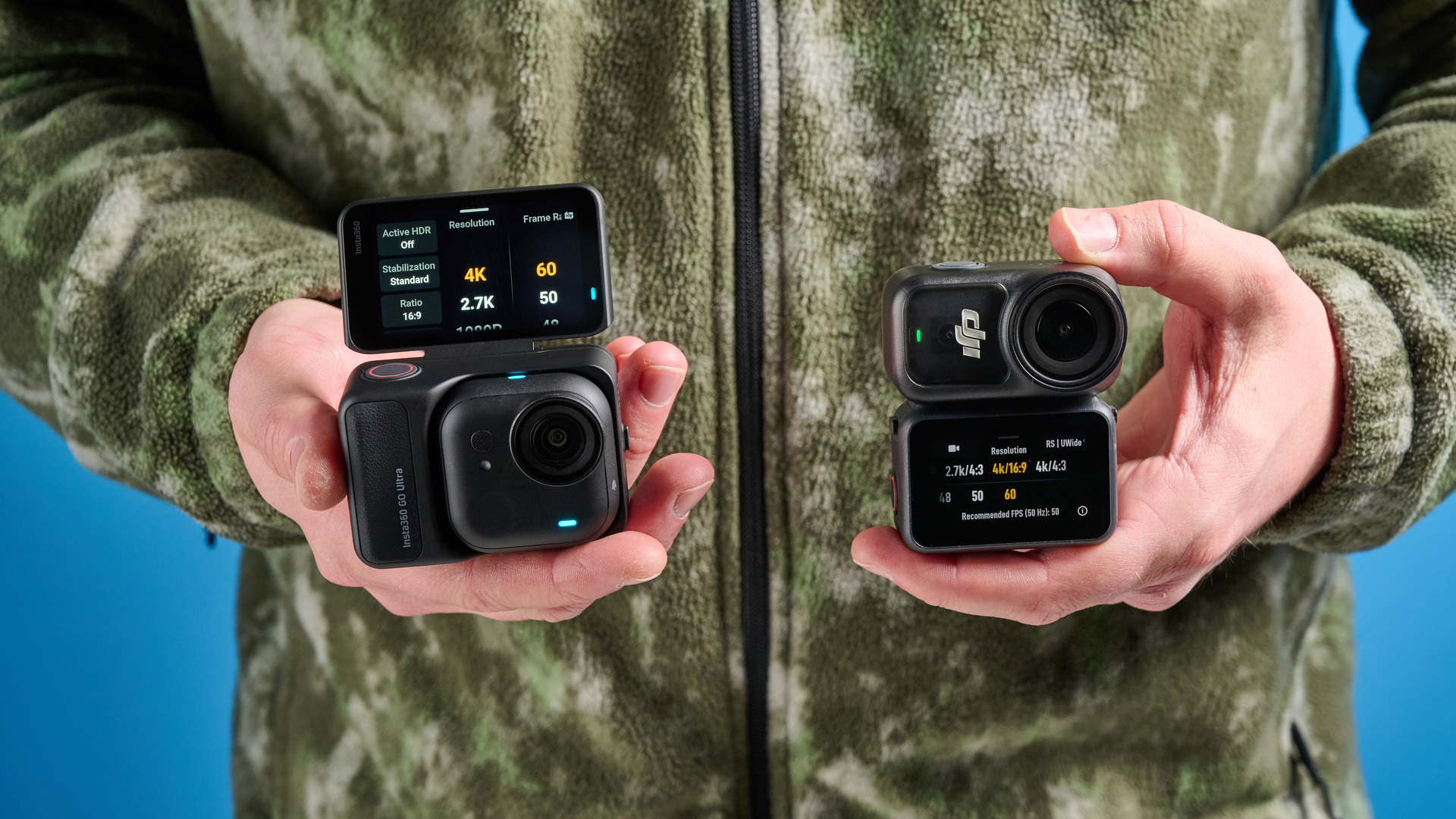 DJI Osmo Nano in hand next to the Insta360 Go Ultra