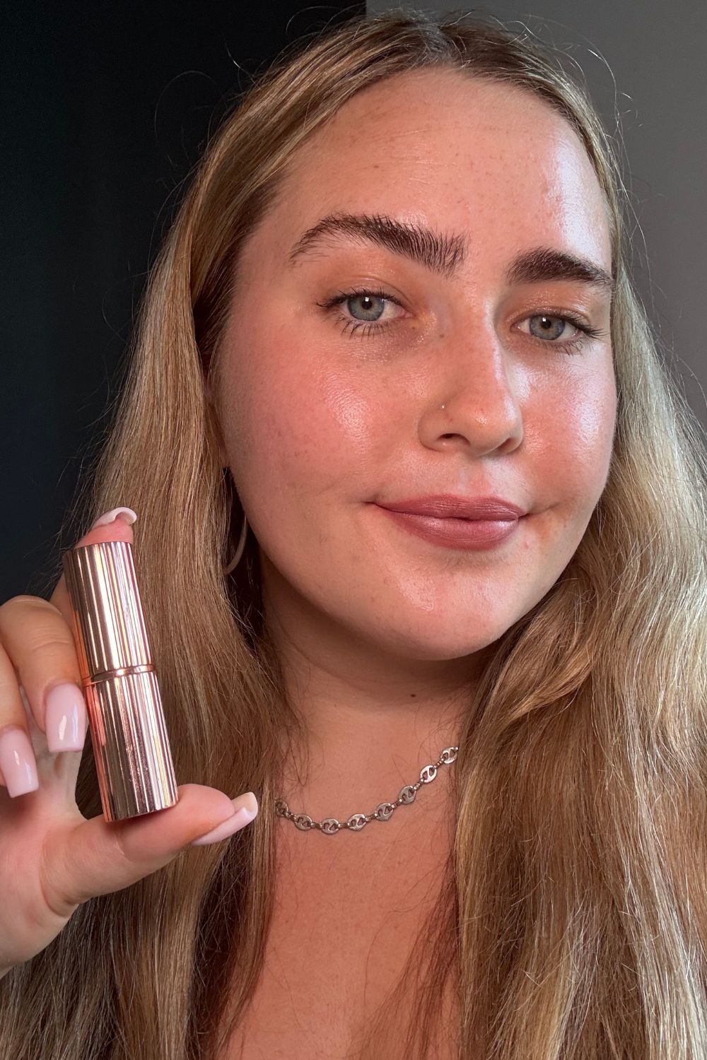 Amelia wearing Charlotte TilburyMatte Revolution Refillable Lipstick