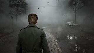 A screenshot of Silent Hill 2's main protagonist James walking into the fog