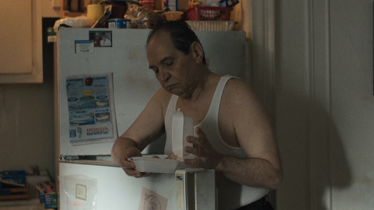 Mike looking at old Chinese food in The Chair Company Episode 5