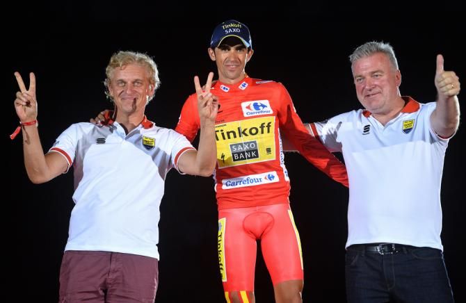Oleg Tinkov with Alberto Contador (Tinkoff-Saxo) on the podium alongiwth Saxo Bank's Lars Seier