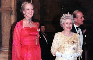 Queen Elizabeth II and Queen Margrethe of Denmark welcome guests at reception hosted by the Danish Queen