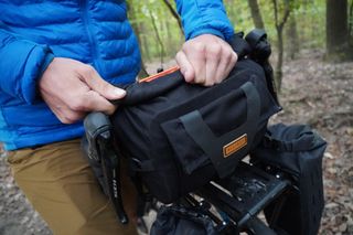 Image shows Stefan packing the Restrap Bar Pack.