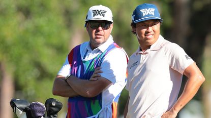 David Lipsky and his caddie talk through a shot